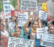  ?? ANI ARCHIVE ?? People protest against Unnao rape case, outside Uttar Pradesh Bhawan in New Delhi on July 30, 2018.