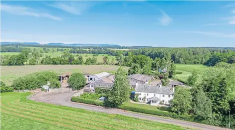  ??  ?? Whitebank Farm extends to more than 60ha and comes with a 300-year-old farmhouse, office accommodat­ion, a range of farm buildings and a detached cottage which could be converted into a holiday home.