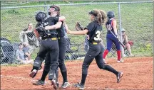  ?? SUBMITTED PHOTO ?? Pitcher Sydney Halliwell, catcher Hannah Sentner and infielder Jessica Turbide celebrate a game-ending strikeout in an extra-inning win versus the She Devils in the semifinals of the recent Lloyd Poirier Memorial women’s fastpitch tournament in Truro, N.S. The Eagles, who returned home with the silver medal, rallied for a 6-4 victory over the She Devils.