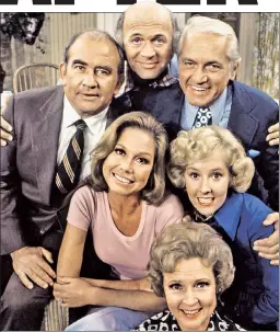  ??  ?? BYE, MARE: Mary Tyler Moore surrounded herself with a comedic cast in “The Mary Tyler Moore Show” — (clockwise from left) Ed Asner, Gavin MacLeod, Ted Knight, Georgia Engel and Betty White.