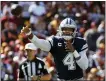  ?? ALEX BRANDON — THE ASSOCIATED PRESS ?? Dallas Cowboys quarterbac­k Dak Prescott (4) passes downfield during the second half.