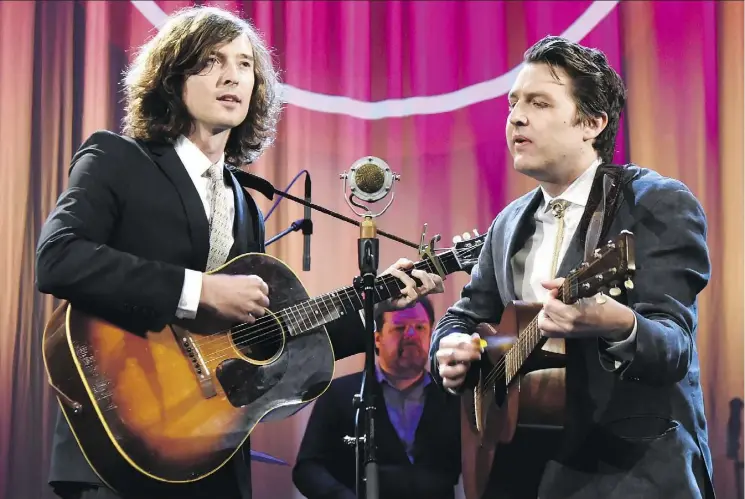  ?? RICK DIAMOND/GETTY IMAGES FOR AMERICANA MUSIC ?? Joey Ryan and Kenneth Pettengale of The Milk Carton Kids will play the Edmonton Folk Music Festival main stage on August 12.