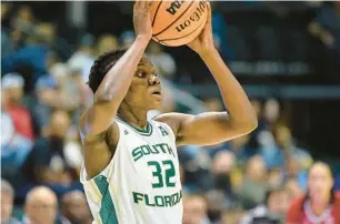  ?? KELLY SHEEHAN/AP ?? USF forward Dulcy Fankam Mendjiadeu, a transfer from Memphis, is a favorite to win AAC player of the Year.