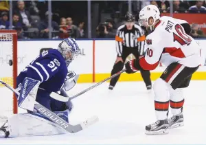  ?? (Reuters) ?? OTTAWA SENATORS forward Tom Pyatt scores the game-winning shootout goal past Toronto Maple Leafs netminder Frederik Andersen to give the Senators a 3-2 victory over their provincial rivals on Saturday night in Toronto.