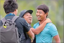  ?? STEPHEN B. MORTON/AP PHOTO ?? Satoshi Kodaira, right, celebrates winning a three-hole playoff against Si Woo Kim at the RBC Heritage on Sunday at Hilton Head Island, S.C.