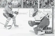  ?? Tom Pennington / Getty Images ?? Dallas’ Ales Hemsky takes a shot against St. Louis’ Brian Elliott in the first period of Friday’s NHL Western Conference second-round game at Dallas.