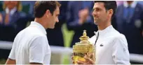  ?? Foto Daniel Leal-olivas/AFP ?? Predlani sta Federer in Đoković uprizorila dih jemajoč finale v Wimbledonu.