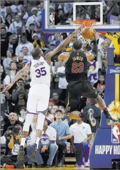  ?? Tony Avelar ?? The Associated Press Warriors forward Kevin Durant blocks a shot by Cleveland’s Lebron James with 24.5 seconds left in Golden State’s 99-92 win Monday at Oracle Arena.