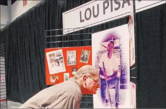  ?? Las Vegas Review-journal file ?? Lou Pisani’s baseball memorabili­a was on display at the Cox Pavilion in 2005 when the longtime coach and volunteer was inducted into the Southern Nevada Sports Hall of Fame.