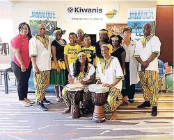  ??  ?? Host chairman for the Kiwanis Eastern Canada and the Caribbean District Convention, Lisa Golding, poses with Louise Paquette, JTB business developmen­t manager, Eastern Canada, and members of the West Can Folk group following a performanc­e to promote...