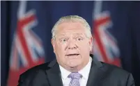  ?? COLE BURSTON THE CANADIAN PRESS ?? Public opinion polls for the Star suggest Doug Ford is in better shape today than he was on his government’s first anniversar­y.