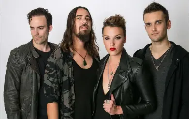  ??  ?? Above: Halestorm with brother and drummer Arejay (second left). Below: a lean, mean, Joan Jettrivall­ing rock machine in 2017. “I really wanted to be like Freddie Mercury and just get out there and
kick ass.”