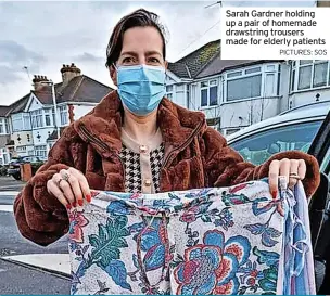  ?? PICTURES: SOS ?? Sarah Gardner holding up a pair of homemade drawstring trousers made for elderly patients