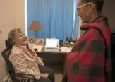  ??  ?? Sister Janice Vanderneck, left, chats with office administra­tor Jennifer Aguilar.