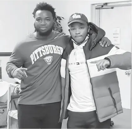  ?? LARRY RUBAMA/STAFF ?? Lake Taylor running back Malik Newton and Booker T. Washington running back Rodney Hammond have been friends for years and opponents on the football field. Now they’ll be teammates at Pittsburgh.