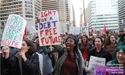  ??  ?? Debt protesters
marching to Philadelph­ia City
Hall in 2019