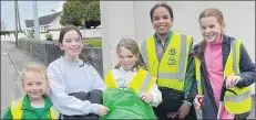  ?? ?? The girls, in conjunctio­n with Glanworth Tidy Towns. We did spring litter picking during the walk.