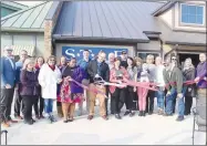  ?? PHOTOS BY LYNN KUTTER ENTERPRISE-LEADER ?? Left: Farmington and Fayettevil­le Chambers of Commerce jointly held a ribbon-cutting ceremony on Feb. 20 for S*T*A*R Physical Therapy, 68 E. Main St., located at Farmington Village center in Farmington. This is the first S*T*A*R clinic in Arkansas. Center: Jill McLean, owner of Dogwood Clothing Co., and Farmington Area Chamber of Commerce celebrate the new boutique during a ribbon-cutting ceremony Feb. 20. The store is located at 68 E. Main St., and is one of the new businesses at Farmington Village. Right: Farmington Area Chamber of Commerce sponsored a ribbon-cutting ceremony Feb. 20 for SELAHSpa, located at the Farmington Village center on Main Street in Farmington. Owner Christie Bates cuts the ribbon for the ceremony.