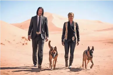 ??  ?? “John Wick: Chapter 3 – Parabellum” stars Keanu Reeves and Halle Berry.