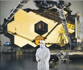  ?? Photograph­s by Chris Gunn NASA ?? “I SOMETIMES TELL people it feels like we sprinted a marathon,” NASA’s Lee Feinberg says of the James Webb Space Telescope, which took decades to finish.