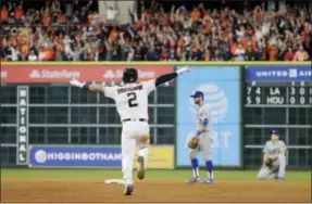  ?? DAVID J. PHILLIP - THE ASSOCIATED PRESS ?? FILE - In this Oct. 30, 2017, file photo, Houston Astros’ Alex Bregman reacts after driving in the game-winning run in the 10th inning of Game 5 of baseball’s World Series against the Los Angeles Dodgers in Houston. The Astros won 13-12.