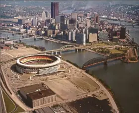  ?? A. Church Photograph­ers ?? While Three Rivers Stadium was mostly finished by this point, dirt surroundin­g the venue shows there was still plenty to be done.