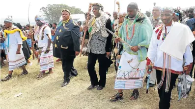  ?? Picture: LULAMILE FENI ?? EMBRACING DIVERSITY: AmaMpondo's Nkosi Nzululwazi Sigcau, King Goodwill Zwelethini, AmaXhosa King Mpendulo Sigcau and King Mparuru III of Pedi at the Mpondo heritage and cultural festival at Lwandlolub­omvu in Matshona village near Ntabankulu on Saturday.