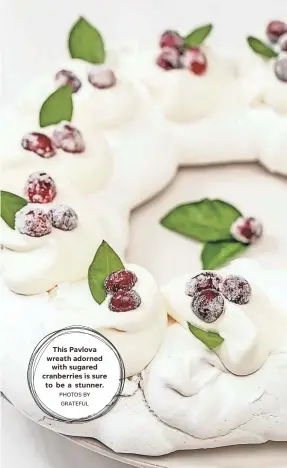  ?? PHOTOS BY GRATEFUL ?? This Pavlova wreath adorned with sugared cranberrie­s is sure to be a stunner.