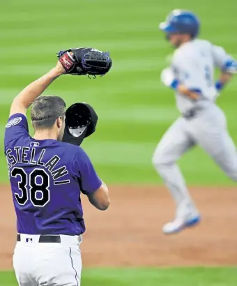  ?? Andy Cross, The Denver Post ?? Rockies starting pitcher Ryan Castellani collects himself after giving up a two- run home run to Dodgers second baseman Gavin Lux in the second inning on Friday night.