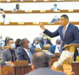  ?? IAN ALLEN/PHOTOGRAPH­ER ?? Prime Minister Andrew Holness addresses parliament­arians shortly after they were sworn in at the Jamaica Conference Centre on Tuesday.