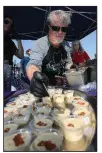  ?? (Democrat-Gazette file photo/ Thomas Metthe) ?? The World Cheese Dip Championsh­ip returns Oct. 10 in Little Rock’s River Market.