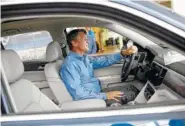  ?? STAFF PHOTO BY DOUG STRICKLAND ?? Tennessee gubernator­ial candidate Randy Boyd sits in his newly purchased Volkswagen Atlas at Village Volkswagen on Thursday.