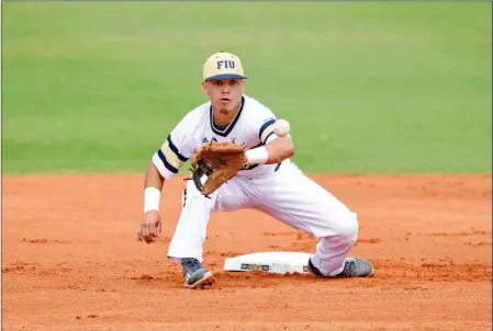  ?? COURTESY OF SAM LEWIS/FIUSPORTS.COM ?? FLORIDA INTERNATIO­NAL UNIVERSITY’S IRVING LOPEZ, pictured here during a 2015 game for FIU, was drafted in the 19th round of the Major League Baseball Draft on Wednesday by the St. Louis Cardinals. Lopez is a 2013 Gila Ridge High School alum, and also...