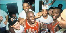  ?? ANDREW D. BERNSTEIN / GETTY ?? Michael Jordan and the Bulls celebrate after winning the 1991 NBA Championsh­ip against the Los Angeles Lakers.