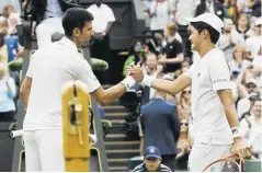  ?? Efe. ?? Djokovic y Soonwoo Kwon saludándos­e al final.