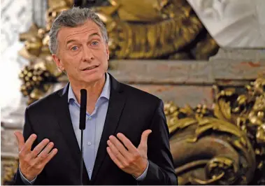  ??  ?? President Mauricio Macri gives a press conference on Thursday at the Casa Rosada. AFP