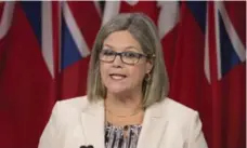  ?? PETER POWER/THE CANADIAN PRESS ?? NDP Leader Andrea Horwath says charging bottling companies more won’t protect water supplies. “The highest bidder still gets the water,” she said.