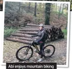  ??  ?? Abi enjoys mountain biking