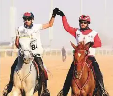  ?? Courtesy: Organisers ?? Saif Al Mazroui (right) celebrates his victory, which the 18-year-old said was the biggest win of his career.