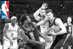  ??  ?? Patrick Beverley #21 and Danilo Gallinari #8 of the Los Angeles Clippers battle for a rebound against Josh Hart #3 and Rajon Rondo #9 of the Los Angeles Lakers during the second half of a game at Staples Center on March 04, 2019 in Los Angeles, California. - AFP photo