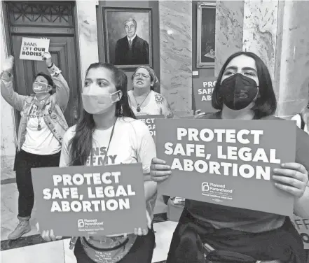  ?? BRUCE SCHREINER/AP ?? Abortion-rights supporters chant their objections at the Kentucky Capitol on April 13, 2022, in Frankfort.