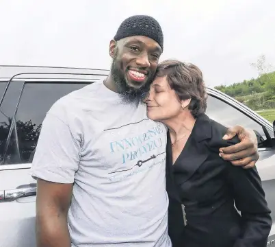  ?? Picture / AP ?? Shaurn Thomas celebrates with lawyer Marissa Bluestine after he was released from jail yesterday.