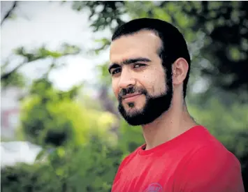  ?? THE CANADIAN PRESS FILES ?? Former Guantanamo Bay prisoner Omar Khadr is seen in Mississaug­a, Ont., on July 6. Three separate opinion polls conducted in recent weeks by different research firms all suggest the Trudeau government hasn’t taken much of a hit for its controvers­ial...