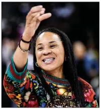  ??  ?? South Carolina’s Dawn Staley was named the women’s college basketball coach of the year by The Associated Press on Monday. Staley led the Gamecocks to a 32-1 record and a No. 1 ranking for the final 10 weeks of the season.
(AP/Sean Rayford)