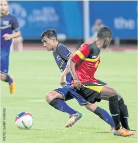  ??  ?? Thailand’s Chanathip Songkrasin, left, in action against Timor Leste at the 2015 SEA Games in Singapore.