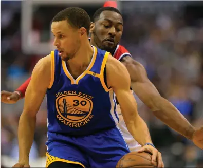  ?? File photo ?? Steph Curry, pictured, and the rest of the NBA still don’t know if they will finish the season. Team facilities are starting to reopen, but players are uneasy about going back to work with the coronaviru­s still spreading.