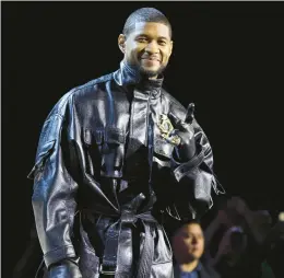  ?? ETHAN MILLER/GETTY ?? Usher speaks during a Super Bowl LVIII press conference Feb. 8 in Las Vegas.