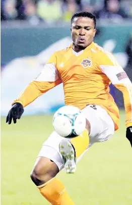  ?? AP ?? Jermaine Taylor in action for Houston Dynamo during the 2013 MLS season.