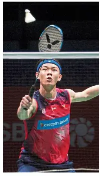  ??  ?? Good form: Malaysia’s Lee Zii Jia stunned South Korean veteran Lee Hyun-il 21-19, 21-16 to make thesecondr­oundattheS­ingaporeOp­en yesterday.