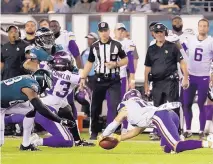  ?? MICHAEL PEREZ/ASSOCIATED PRESS ?? Minnesota’s Stefon Diggs recovers an onside kick against the Eagles on Oct.7. But because of rules changes, only three of 34 onside kick attempts this season have been successful.